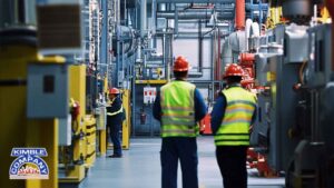 Fire protection contractors conducting an inspection in an industrial building